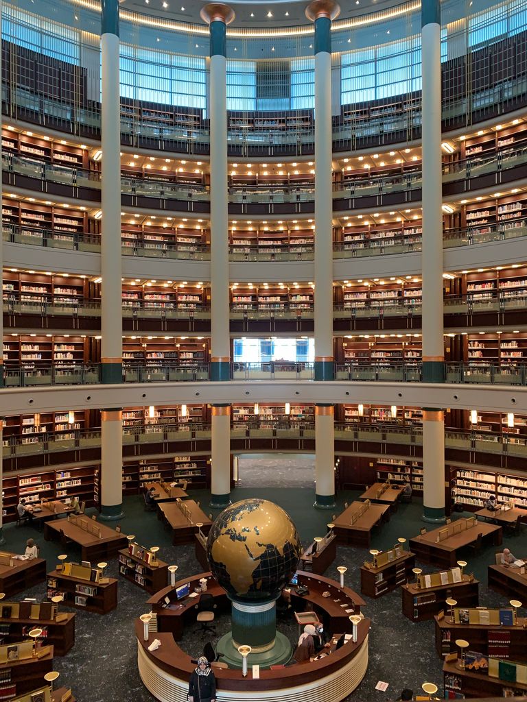 Explore this large, beautifully designed public library with a central globe display.